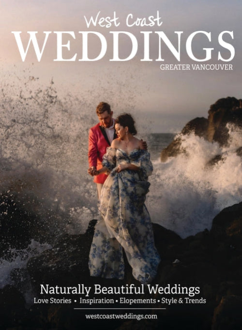 West Coast Weddings Greater Vancouver magazine cover featuring a couple standing on dark rocks with crashing ocean waves behind them. Large white title text reads 'West Coast WEDDINGS' at the top, and smaller cover text appears at the bottom.