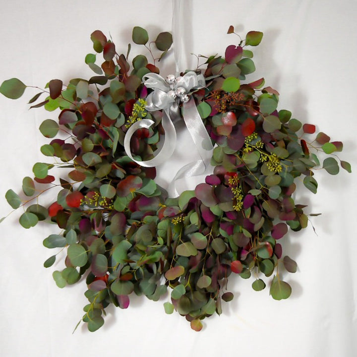 XMAS-1349 WREATH - ALL SEASONS TINTED RED SILVER DOLLAR EUCALYPTUS Petalino Flower Bar & Events